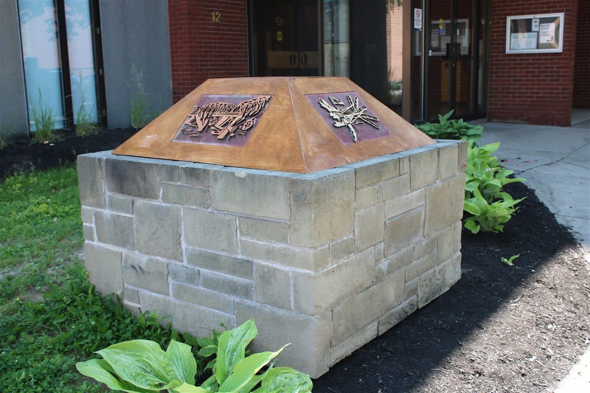 Impressions of Fredericton by Eric Budovitch, interactive stone installation in front of the Fredericton Public Library